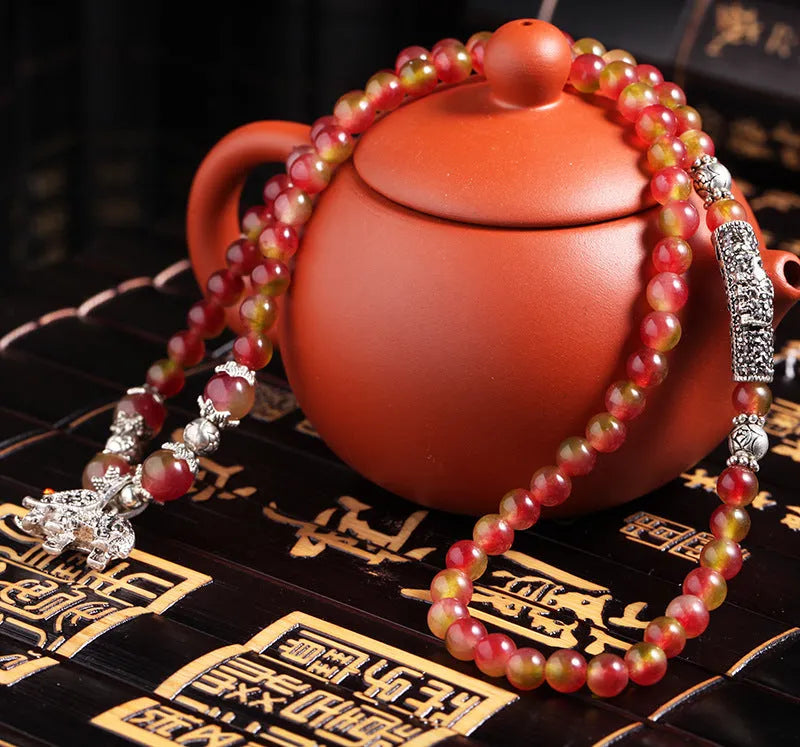 Handmade watermelon crystal bracelet with Chinese knot in 8mm or 6mm elephant style beads.