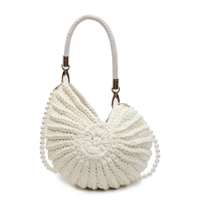 Handmade woven cloth bag in retro style with open pocket and double shoulder straps.