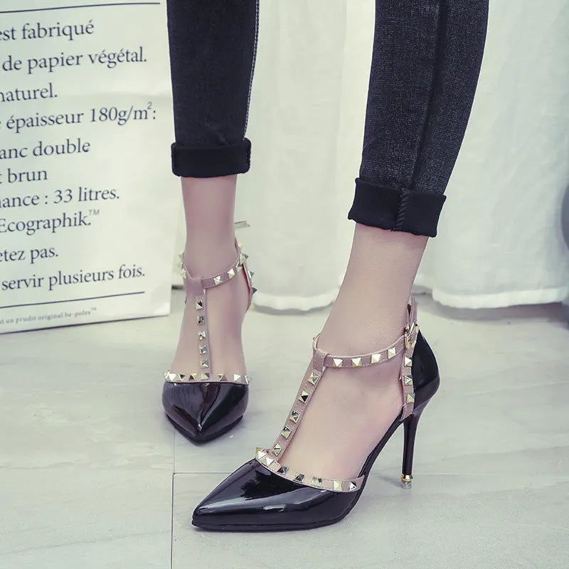 Studded pointed high heels in Black with stiletto heel and buckle fastening