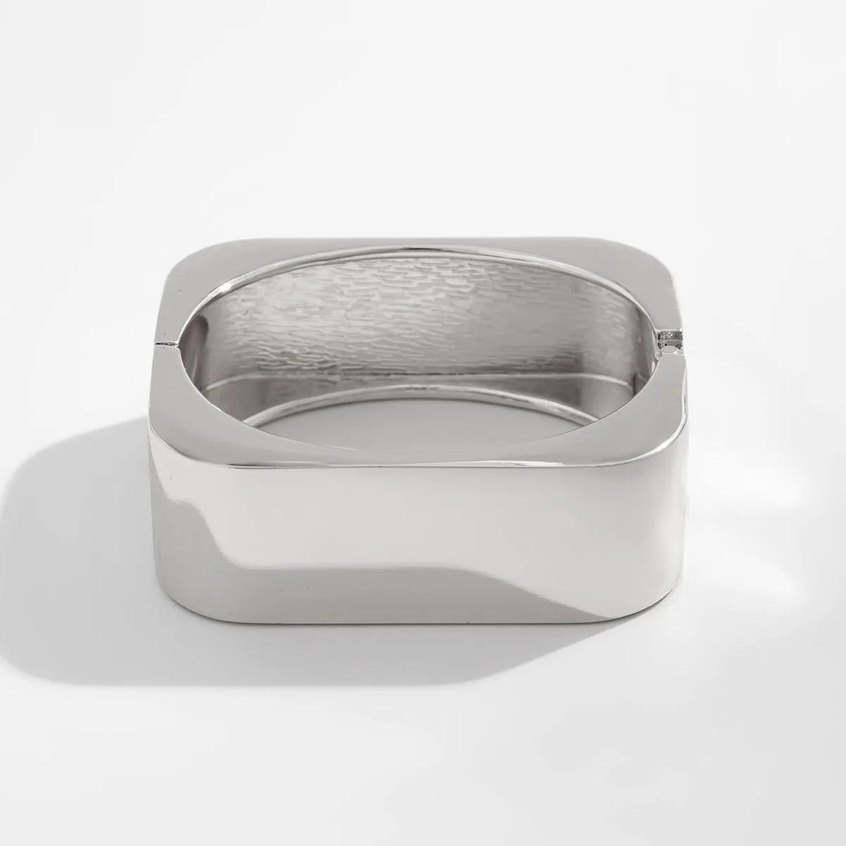Geometric square mirror bracelet with glossy electroplated alloy finish in Gold or Silver Sweep colour