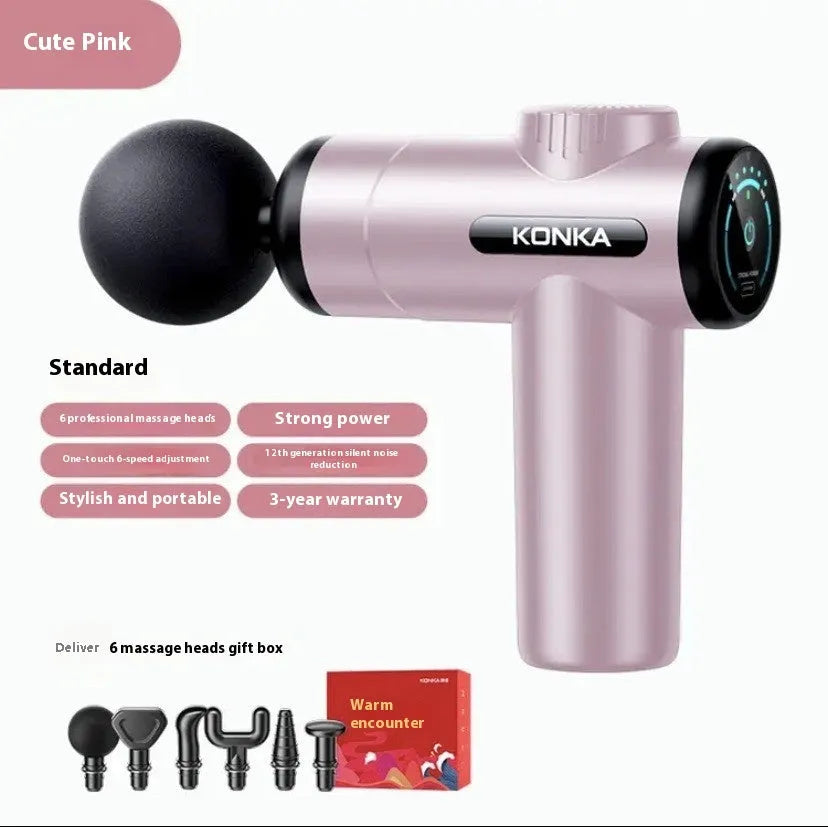 Konka V19 grey massage gun with multiple silicone attachment heads on a table.