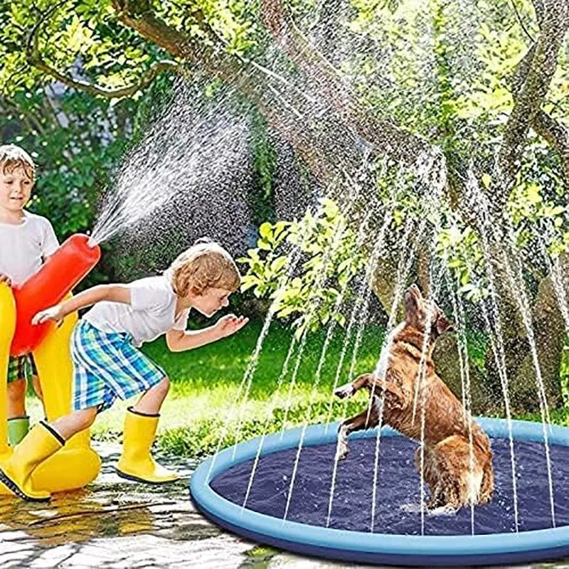 Inflatable blue dog splash pool mat with anti-slip texture, shown in a garden with a dog playing
