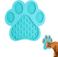 Blue silicone dog licking mat with bone texture and suction cups on back for bath time and slow feeding.