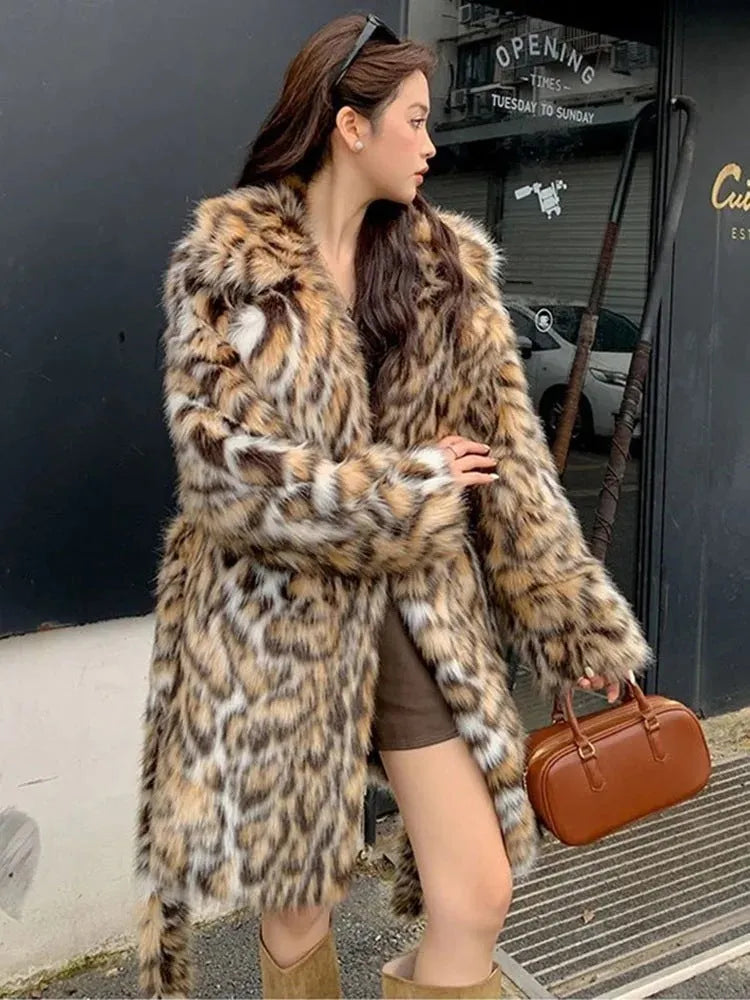 Street fashion faux fur coat with fur collar in mid-length style showing pocket detail