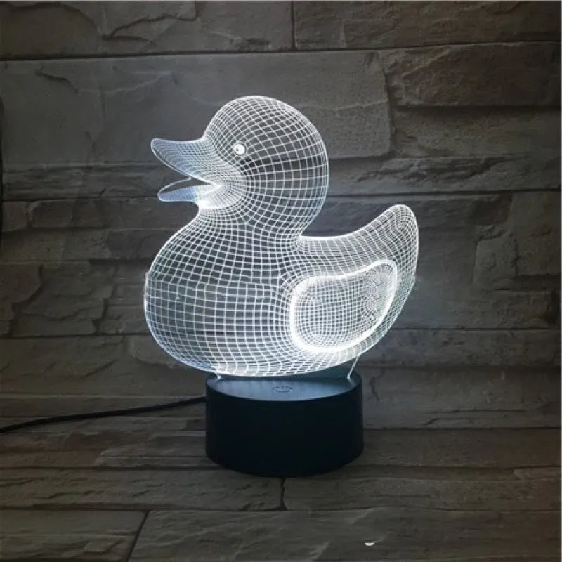 Yellow duck-shaped 3D acrylic night light with ABS base, showing multi-colour LED glow.