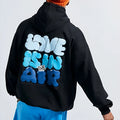 Black cotton blend pullover hoodie with milk bottle and lemon print on front, plus velvet finish
