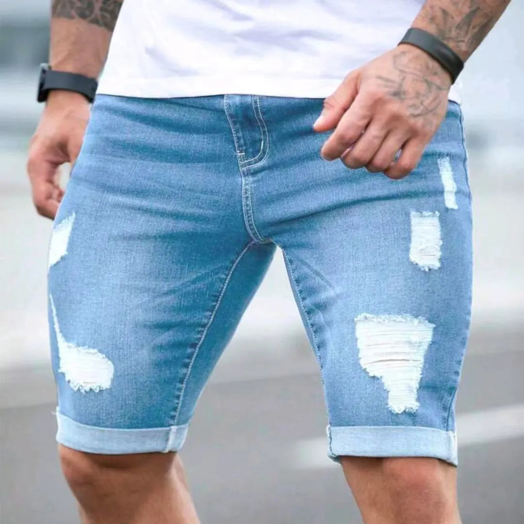 Men's sky blue straight-leg denim shorts with low waist and zipper fly.