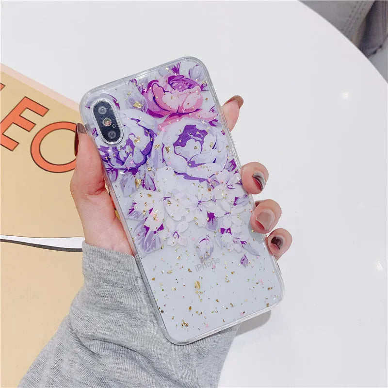 Gold foil epoxy flower pattern iPhone back cover case for iPhone 11 Pro on a table