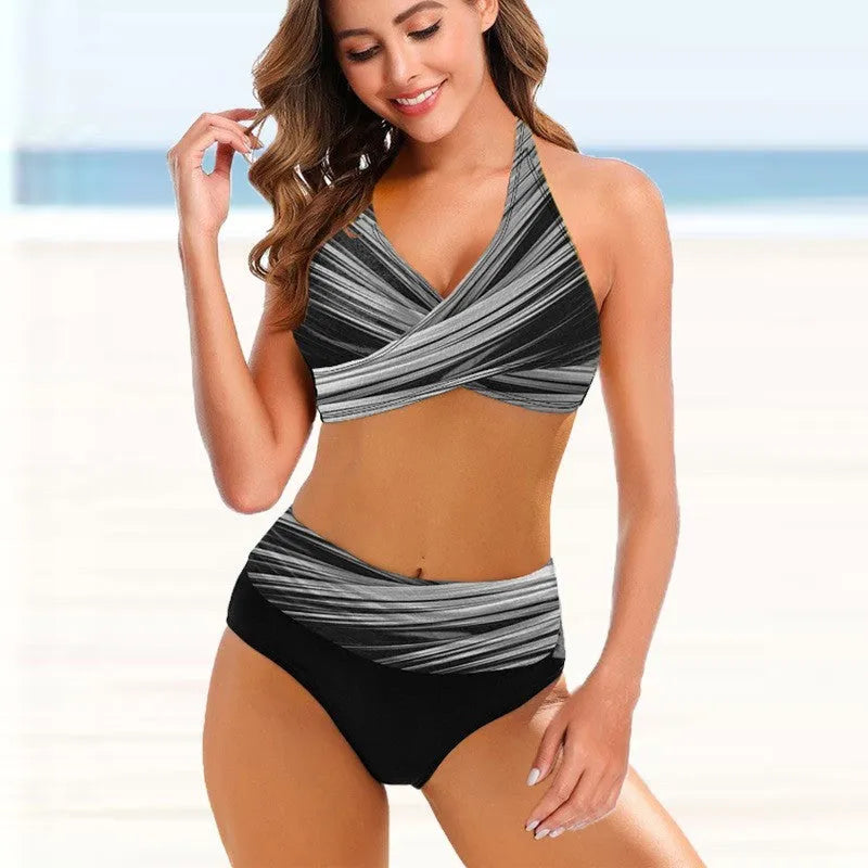 Women's striped tie-dye bikini set with high-waisted briefs and a backless top on a mannequin.