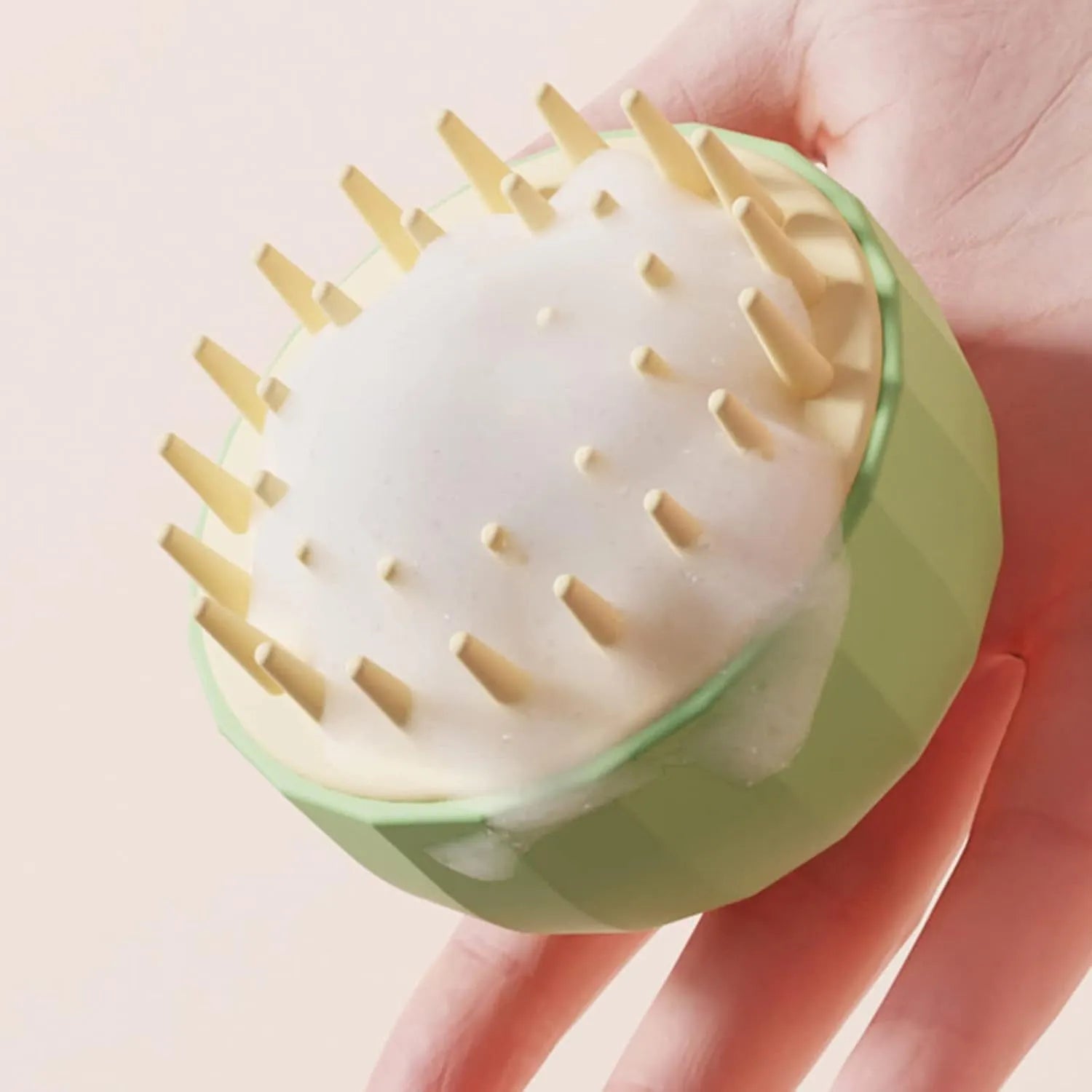 Four pet shampoo massage brushes in green, pink, and white colours with double-sided design and drain holes