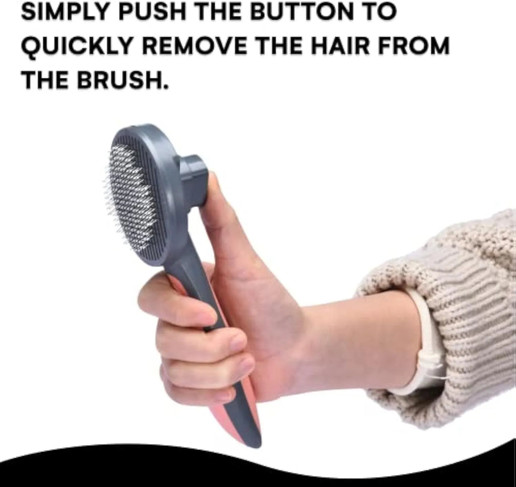 Grey self-cleaning slicker brush for grooming cats and dogs, showing the one-touch button and soft bristles.