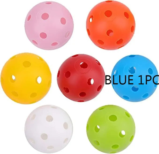 Multi-coloured 42mm golf practice balls with dimpled design in a net bag.