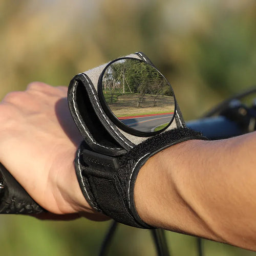 Black nylon bicycle rear-view mirror mounted on handlebars
