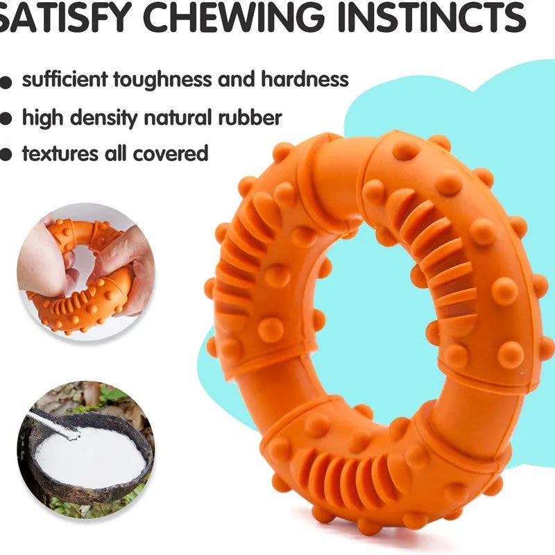 Blue hollow dog fetch stick toy lying on grass, showing its lightweight chewy construction.