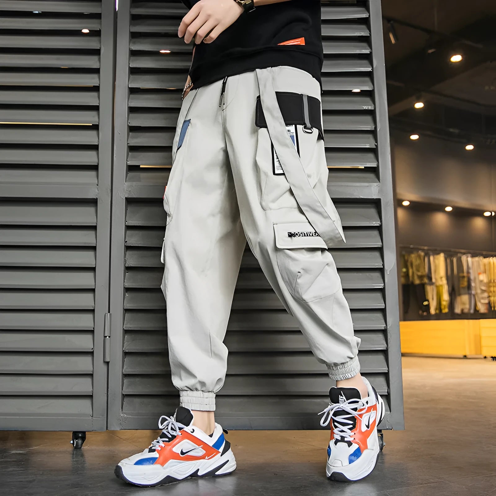 Men's multi-pocket loose fit workwear casual pants in black, grey, and light green with T400 cotton fabric