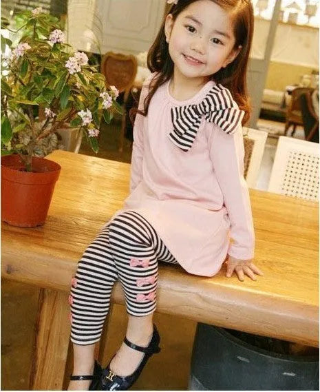 Pink cotton girls' clothing set shown in sizes from 110cm to 140cm