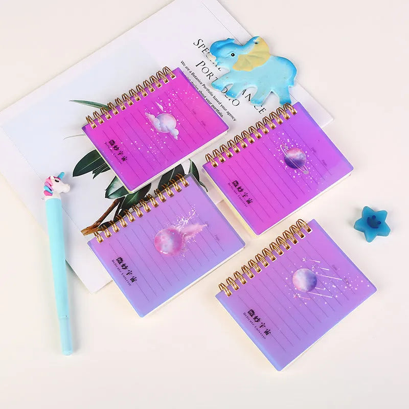 A7 rollover coil pocket notebook in four colours with spiral binding and PP cover