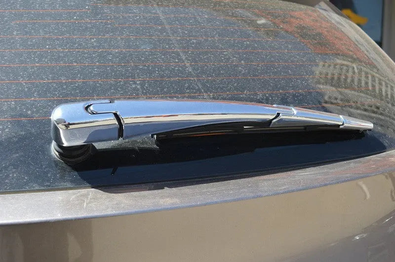 Set of four silvery ABS plastic rear window wiper cover trims for 2010 Hyundai models.