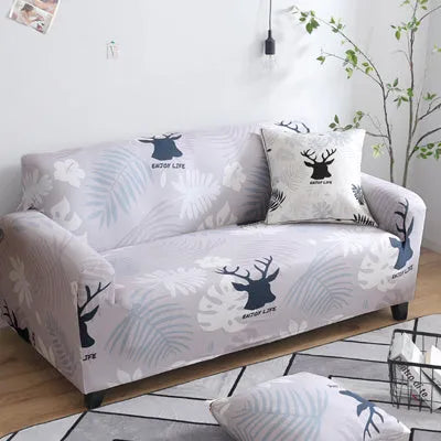 Geometric patterned stretch sofa slipcover fitted on a three-seater sofa