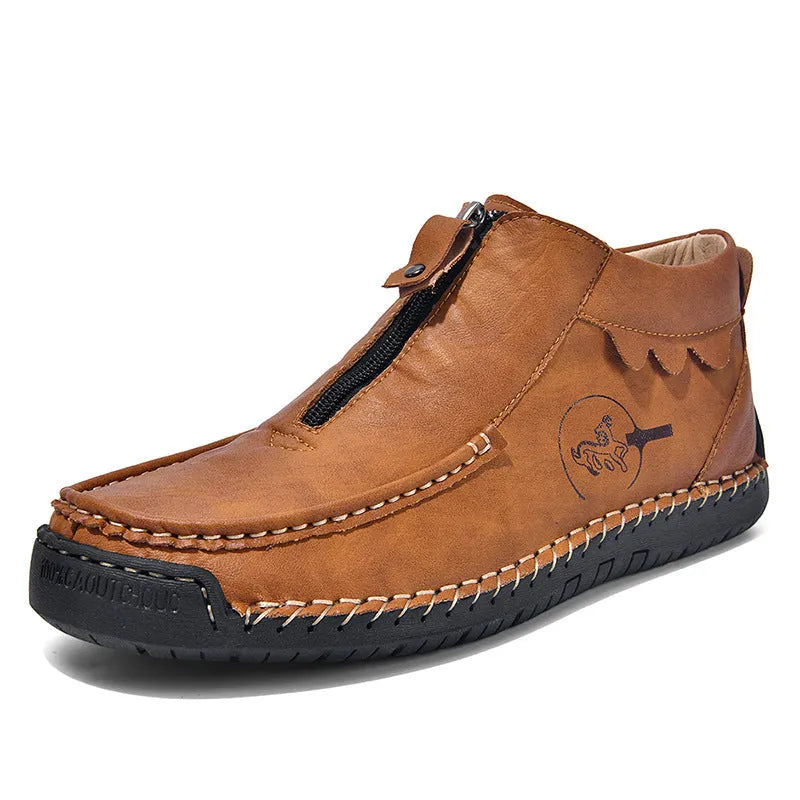 Men's black slip-on leather loafers with round toe and rubber sole, displayed on a white background.