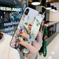 Samsung Galaxy phone case with folding bracket extended, showing floral pattern design