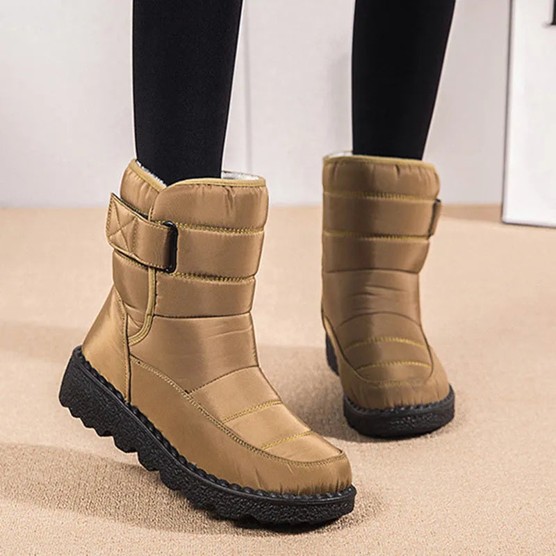 Women's waterproof snow boots with canvas upper, PU sole, buckle closure, and belt decoration