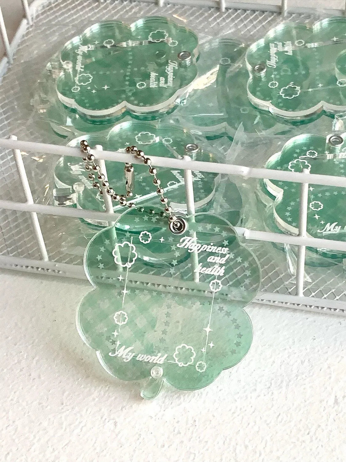 Acrylic four-leaf clover keychain pendant in blue, green, or mint green