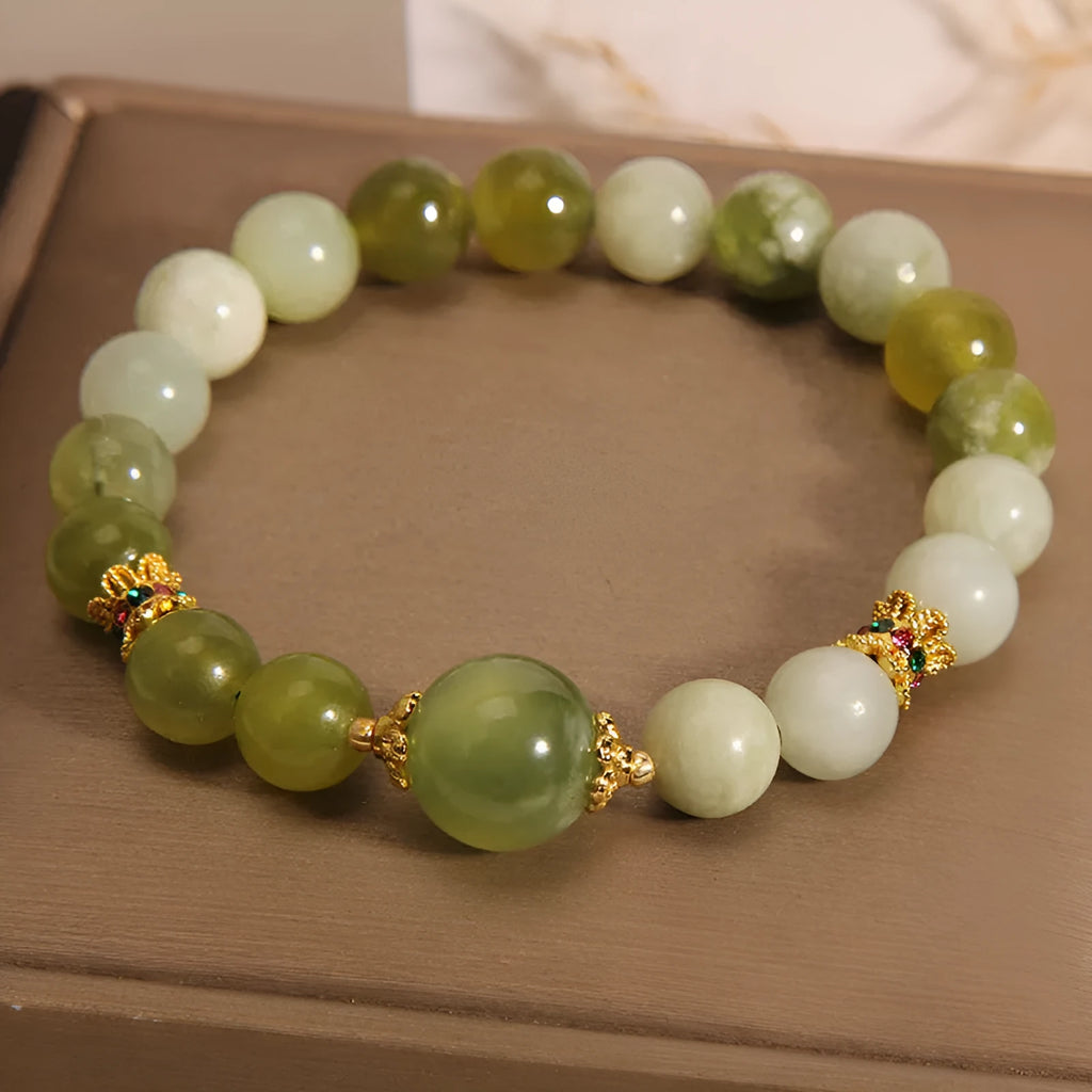 Women's original design bracelet made from green Xiuyan jade in a light luxury sweet Mori style.