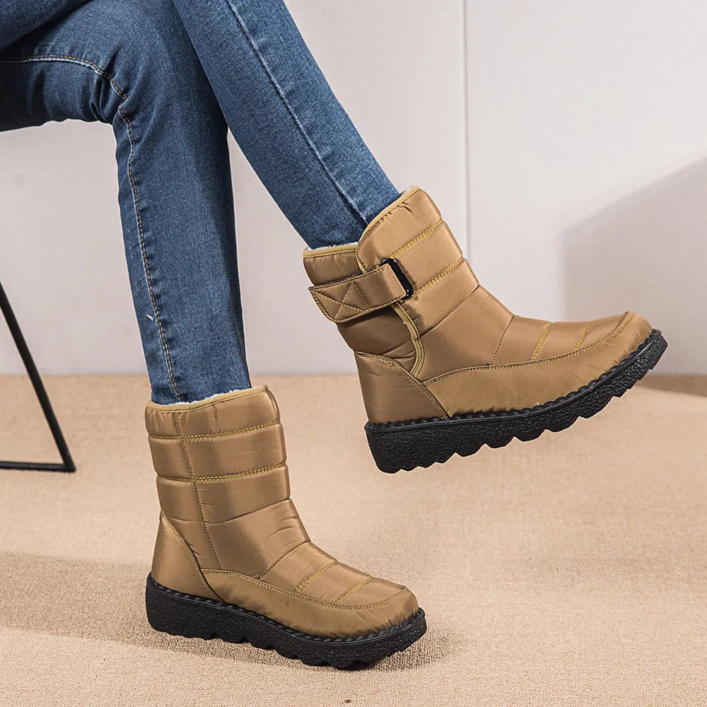 Women's waterproof snow boots with canvas upper, PU sole, buckle closure, and belt decoration