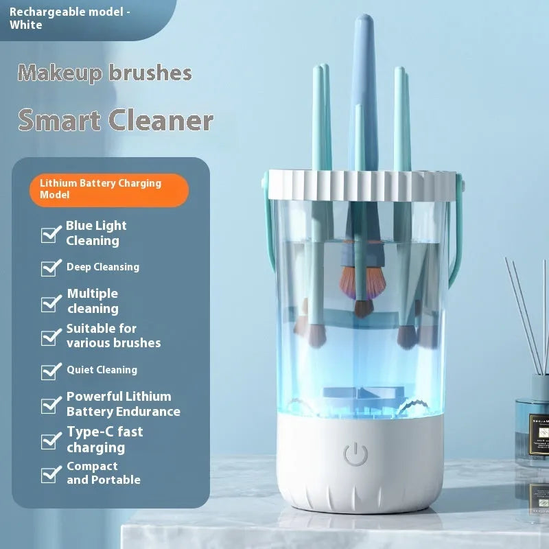 White rechargeable electric makeup brush cleaning tool with data cable.