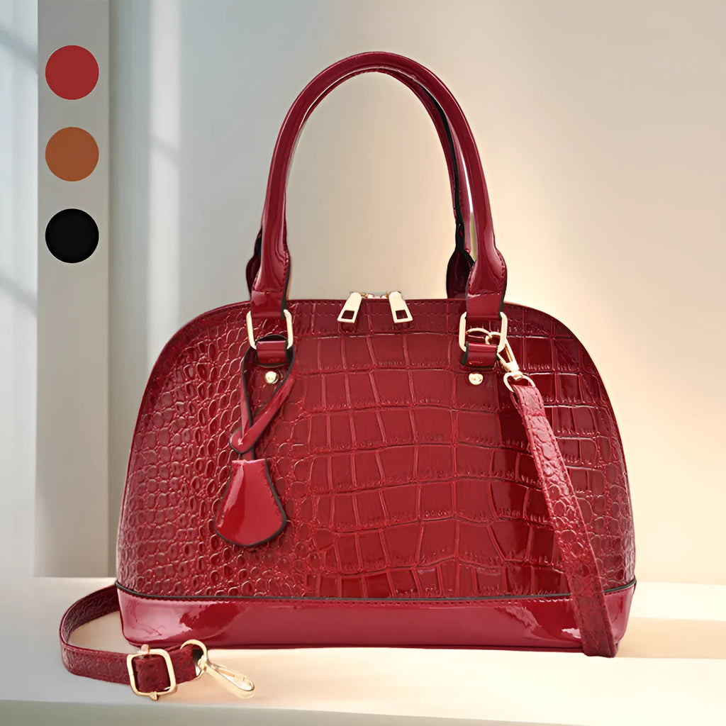 Shiny PU crossbody bag with shell shape, shown in black, red, or brown colour options