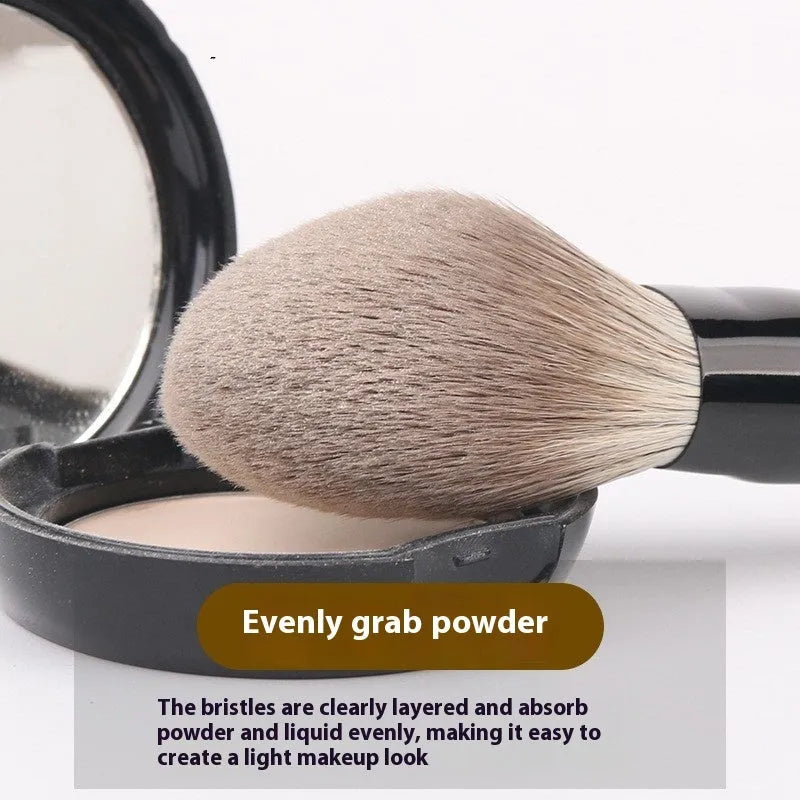 12-piece makeup brush set with wooden handles in a grey PU zip case