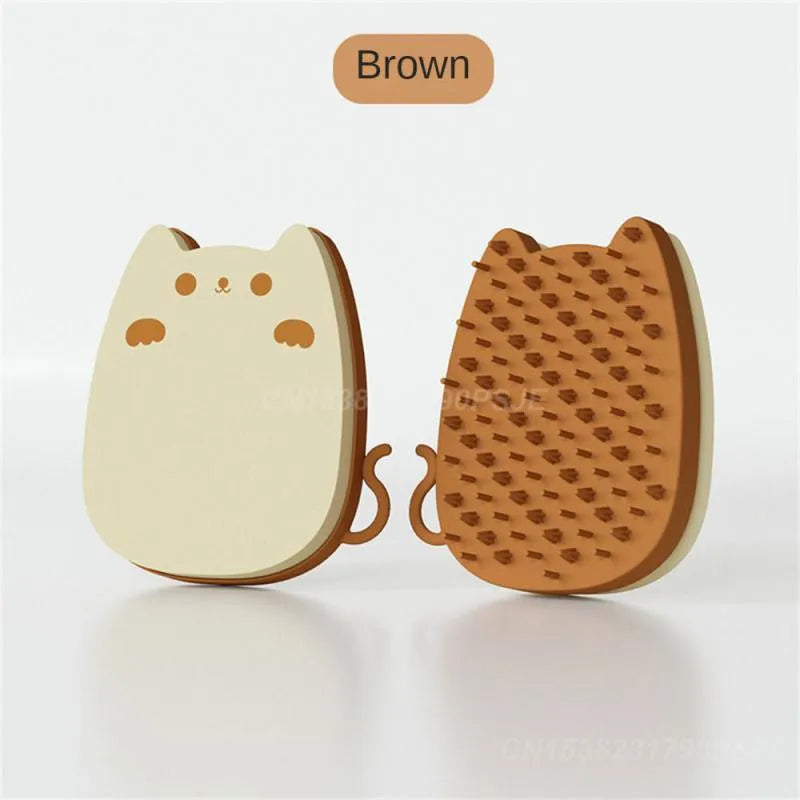 Blue silicone pet grooming comb sponge with dual-texture bristles on a white background.