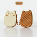Blue silicone pet grooming comb sponge with dual-texture bristles on a white background.
