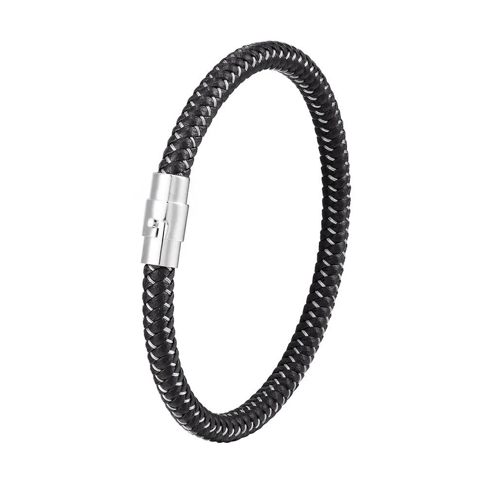 Geometric titanium steel wire bracelet with hidden magnetic clasp on a wrist, showing matte grey finish.