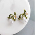 Women's alloy flower earrings showing camellia stud and ear clip options with personality contrast colour