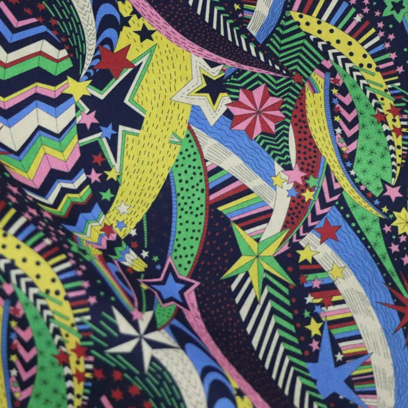 Blue digital print cotton fabric with plant and flower pattern showing 145cm width measurement