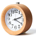 Solid beech wood alarm clock with white dial showing 4-inch diameter and wooden case