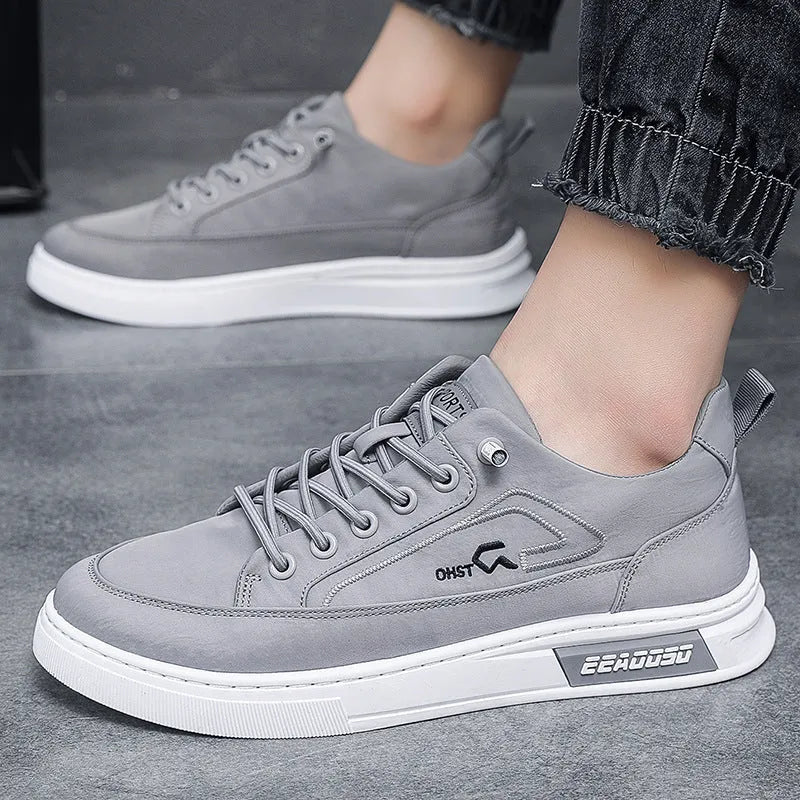 Men's grey canvas casual sneakers with round toe and low-top design featuring breathable ice silk fabric