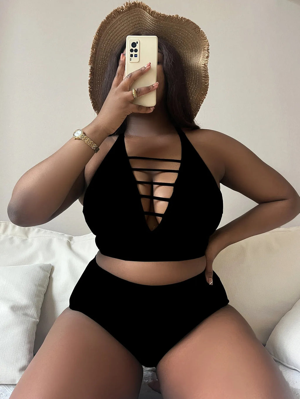 Plus size women's halter bikini with adjustable cross straps and high-waisted briefs in solid colour