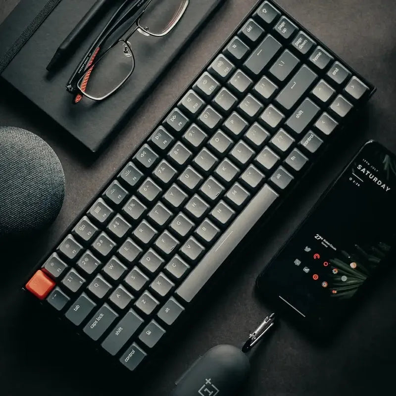 Grey 87-key mechanical keyboard with white backlight, plastic edge, USB Bluetooth Type-C connections