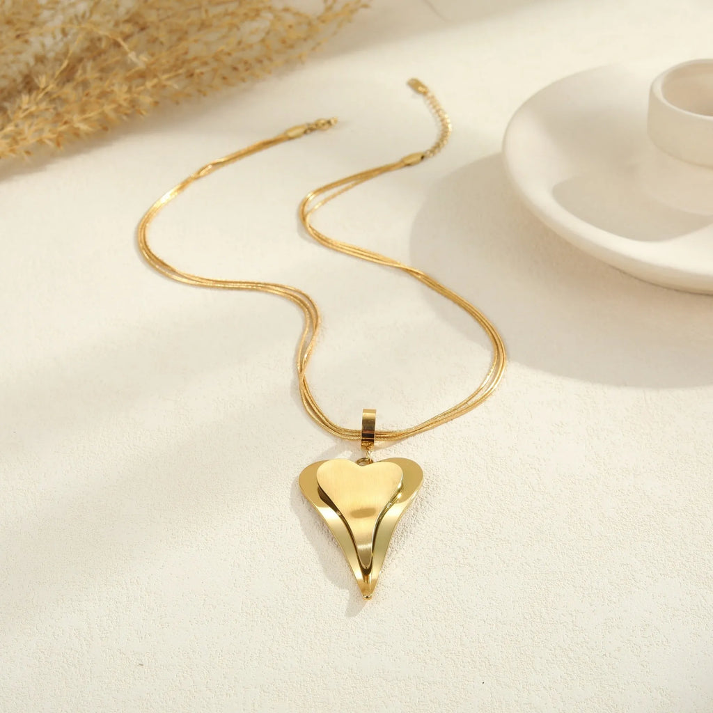 Double heart snake bones chain necklace with geometric pendant in stainless steel with 18K electroplated finish