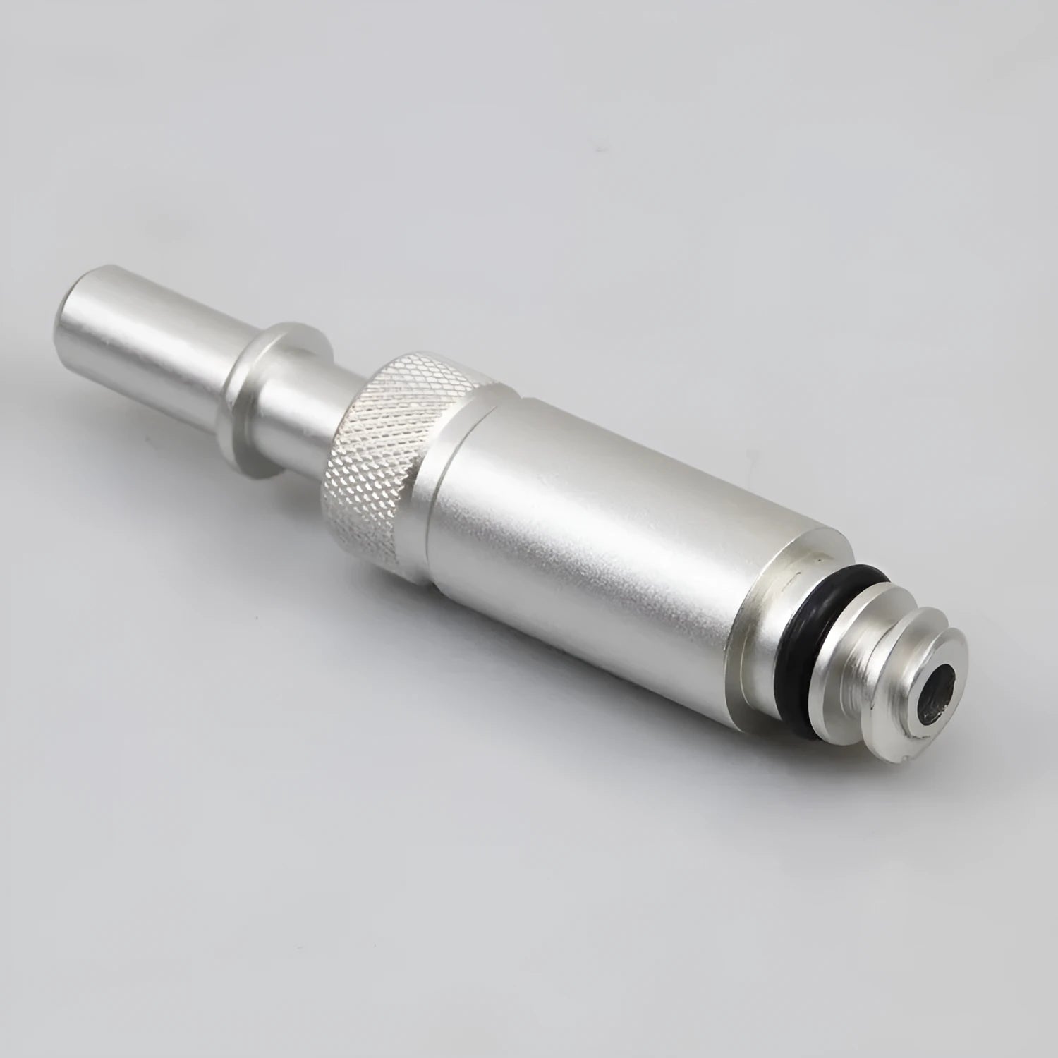 Silver metal transmission refueling joint for VAS6262-9 adapter, weighing 500g.