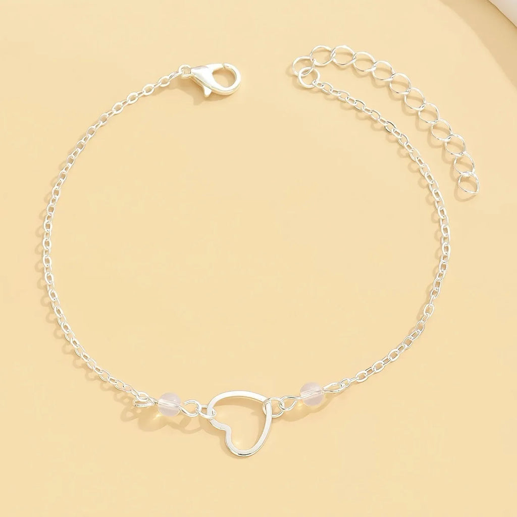 Women's adjustable anklet with heart pendant in gold and silver colours