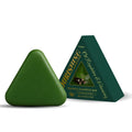 Triangle-shaped solid shampoo bar weighing 120g with visible ingredients list.
