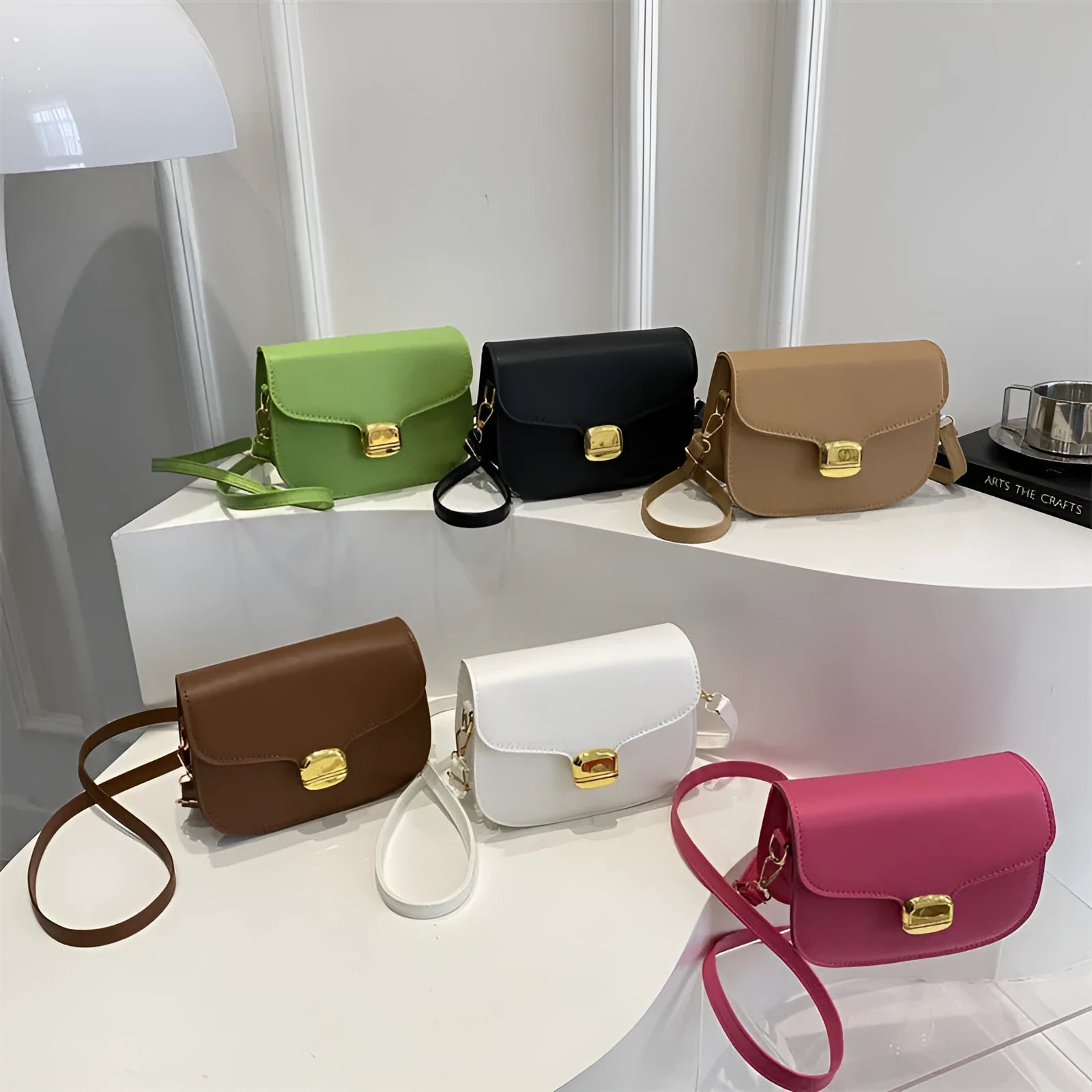 Simple PU leather women's handbag in khaki with internal zipper pocket and phone compartment.
