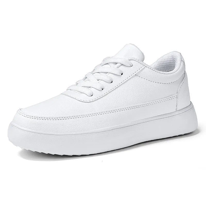 Women's gold leather lace-up flat casual shoes on a white background.