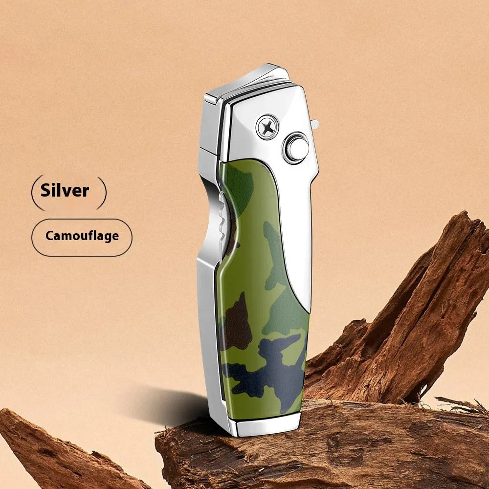 Closed metal folding lighter with integrated knife in a carbon fibre finish, showing the safety lock and refill valve.