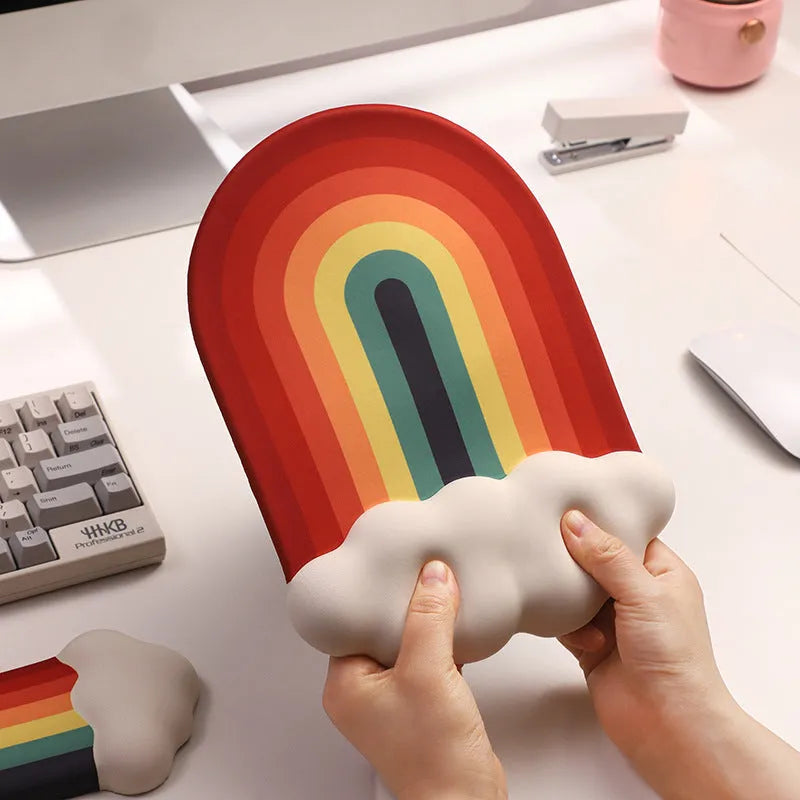 Silicone wrist rest mouse pad and keyboard holder set with cloud pattern on a desk.