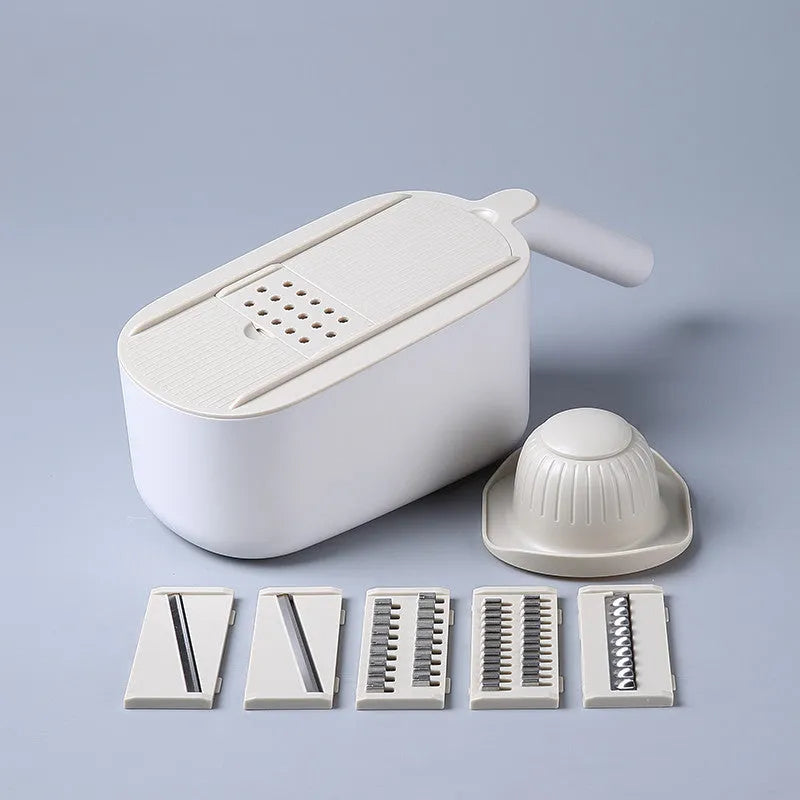 Nordic style manual vegetable slicer with stainless steel blades in blue, grey, and khaki colour options.
